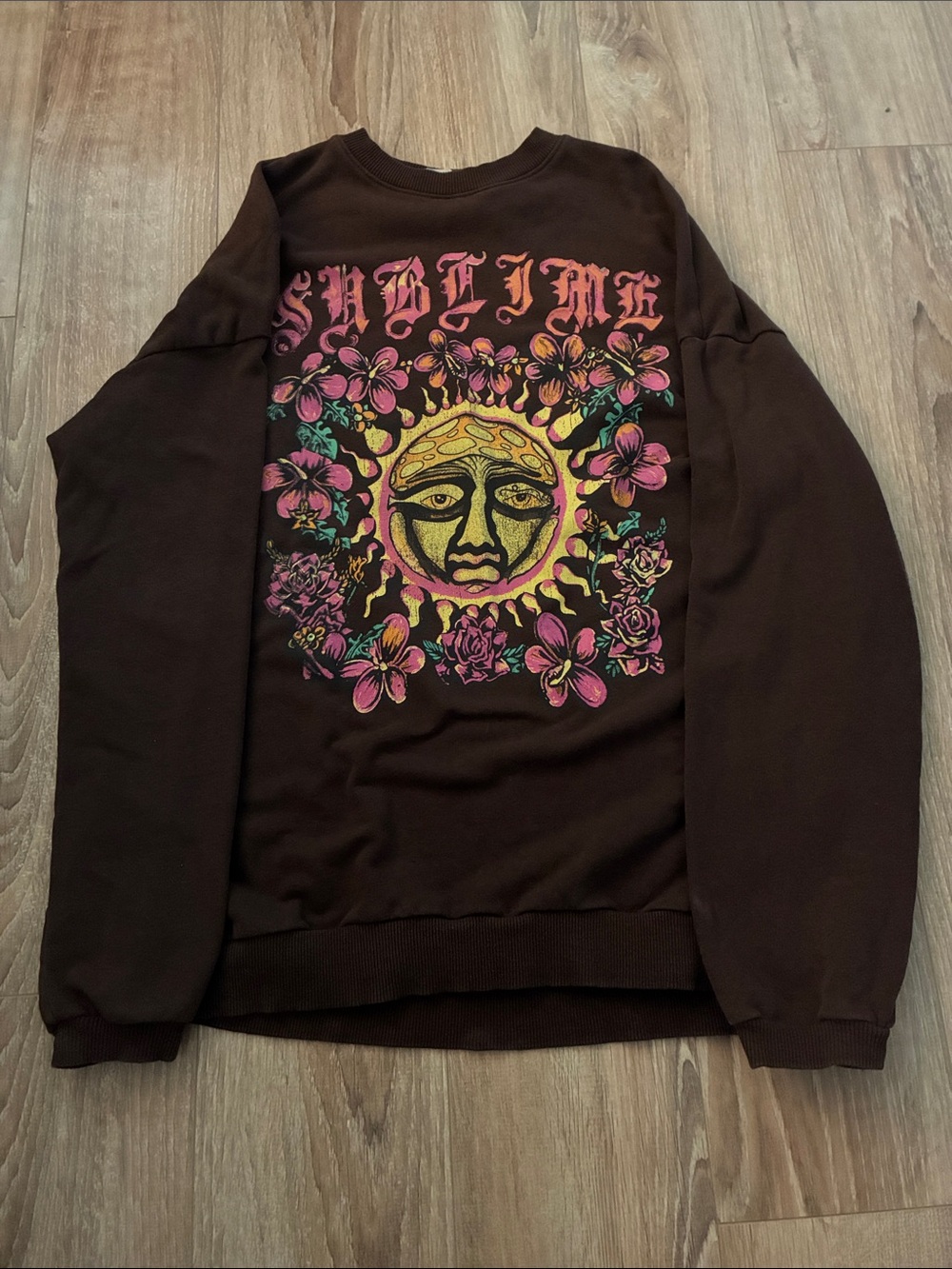 H&M Brown Crewneck Sweatshirt with Sun Graphic and Floral Accents